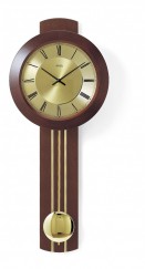 Horloge murale à balancier en bois de noyer