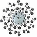 Horloge murale en m&eacute;tal fleurs noires brillants en verre